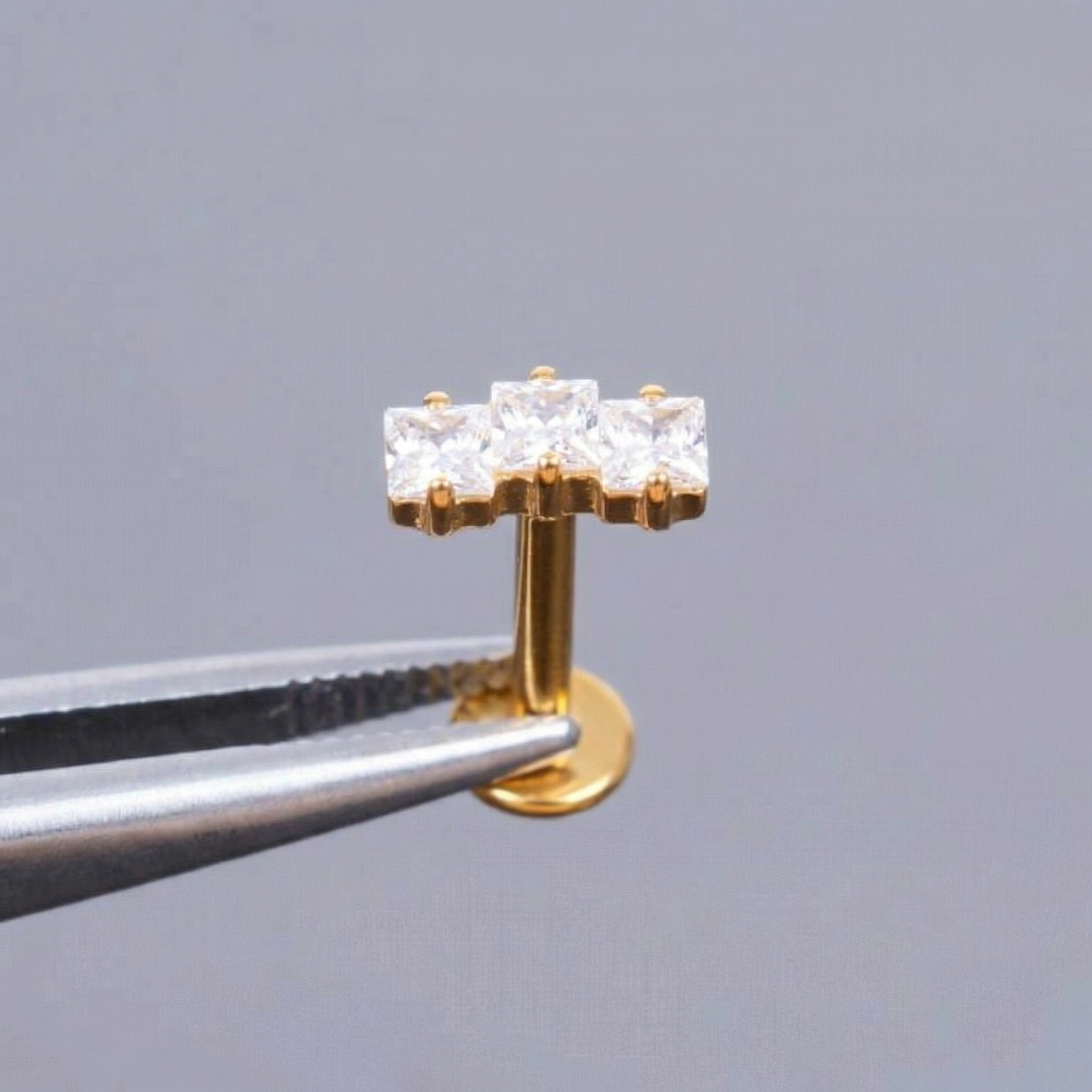 Zircon Helix Ear Piercing - Gold medical-grade titanium stud