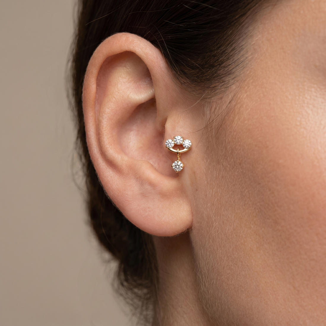 Gold triple zircon dangle stud — tragus jewelry placement