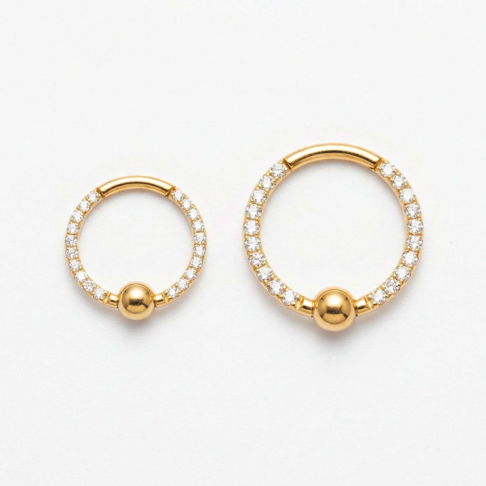 Side-by-side size comparison of the 8mm and 10mm gold zircon center bead