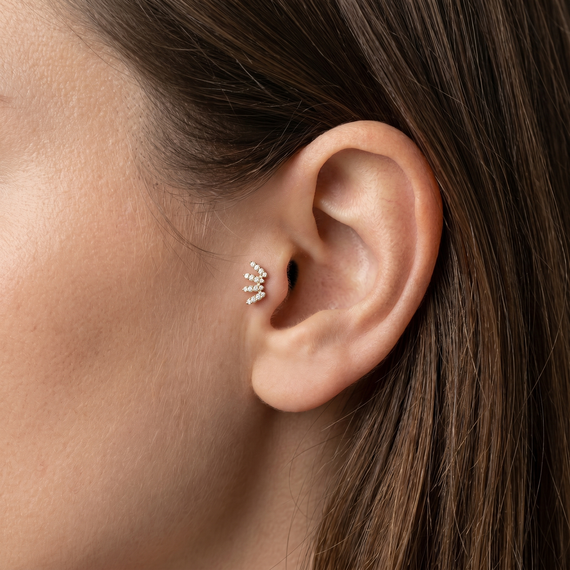 Gold zircon crawler stud — tragus jewelry placement