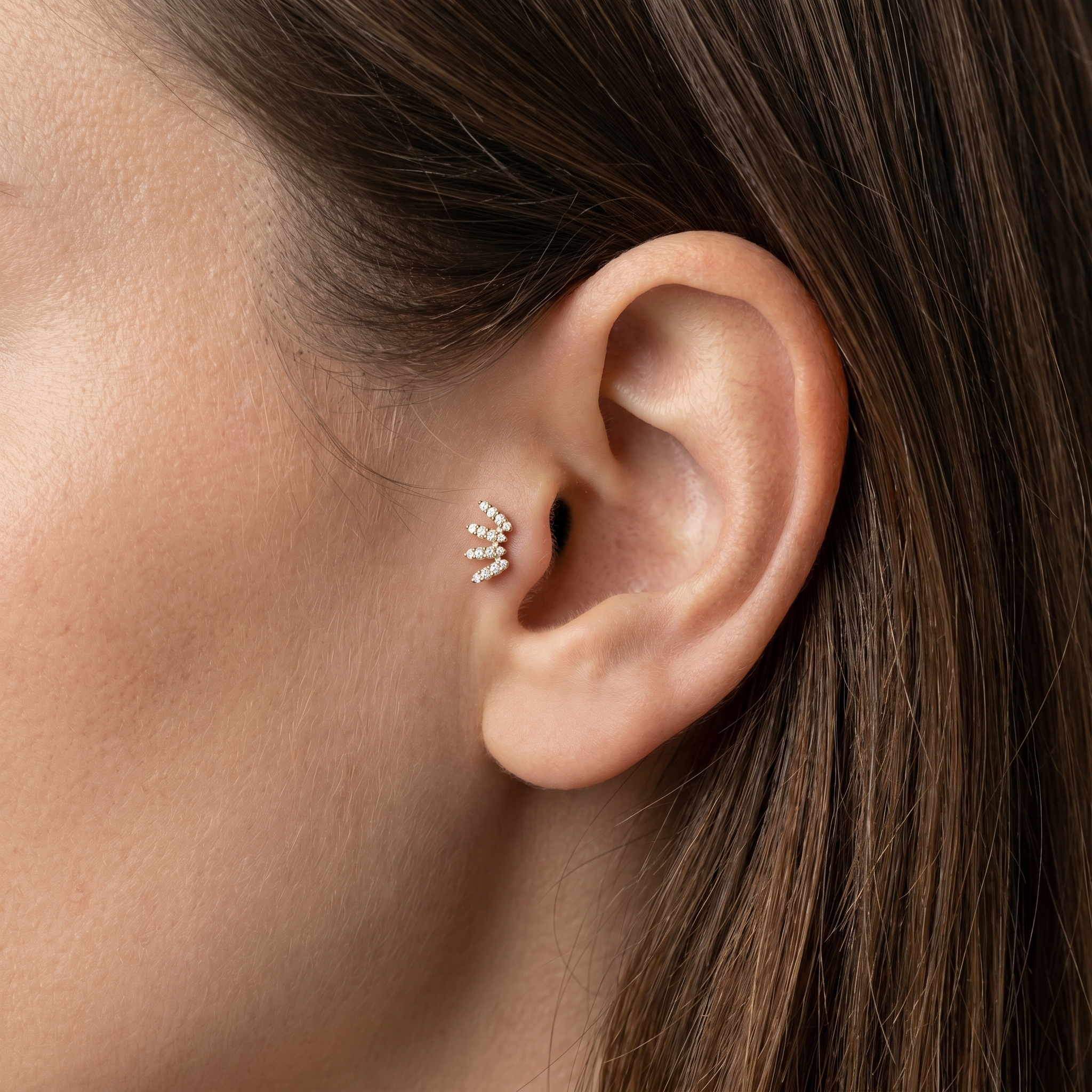 Gold zircon crawler stud — tragus jewelry placement