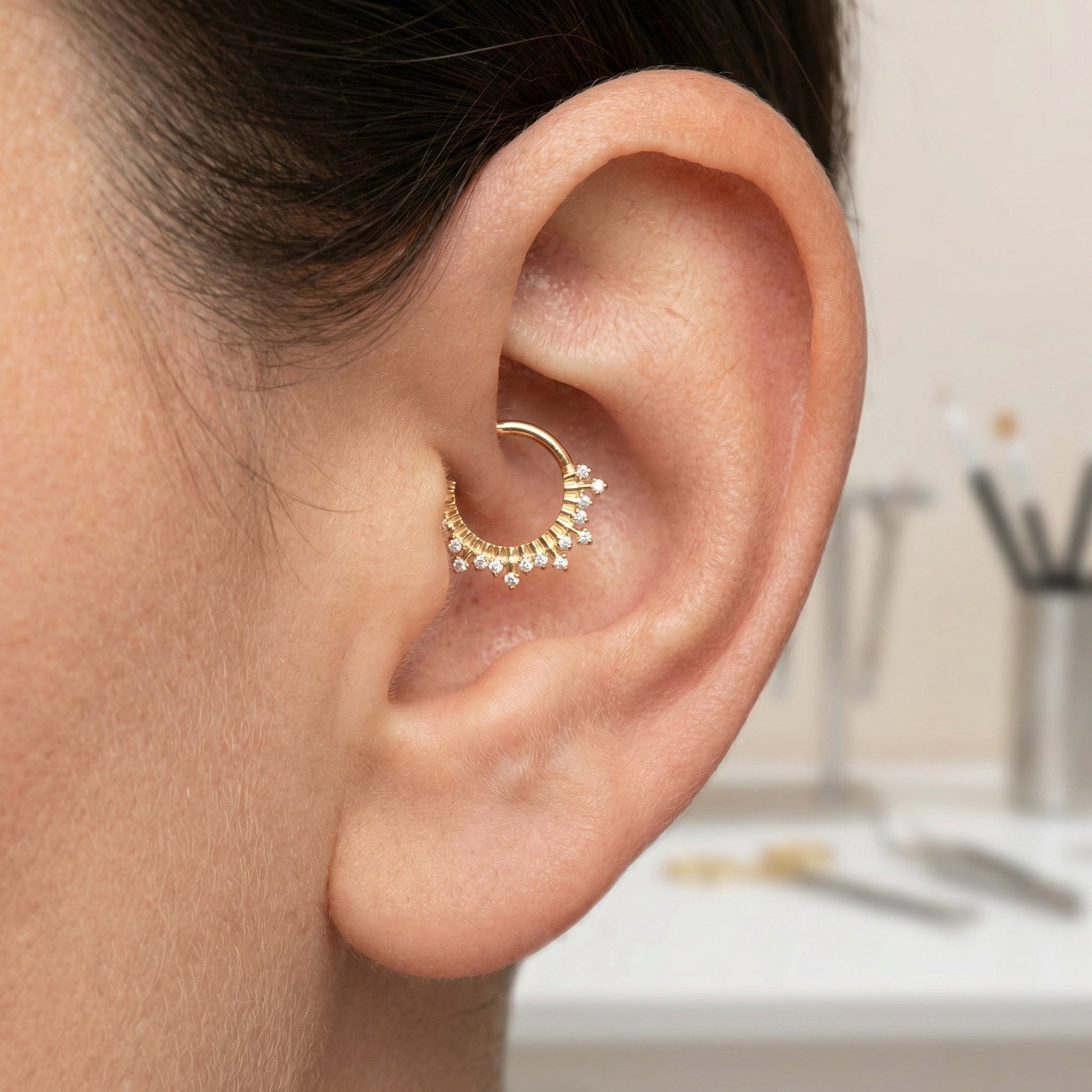 Gold zircon crown hinged stud — daith piercing placement