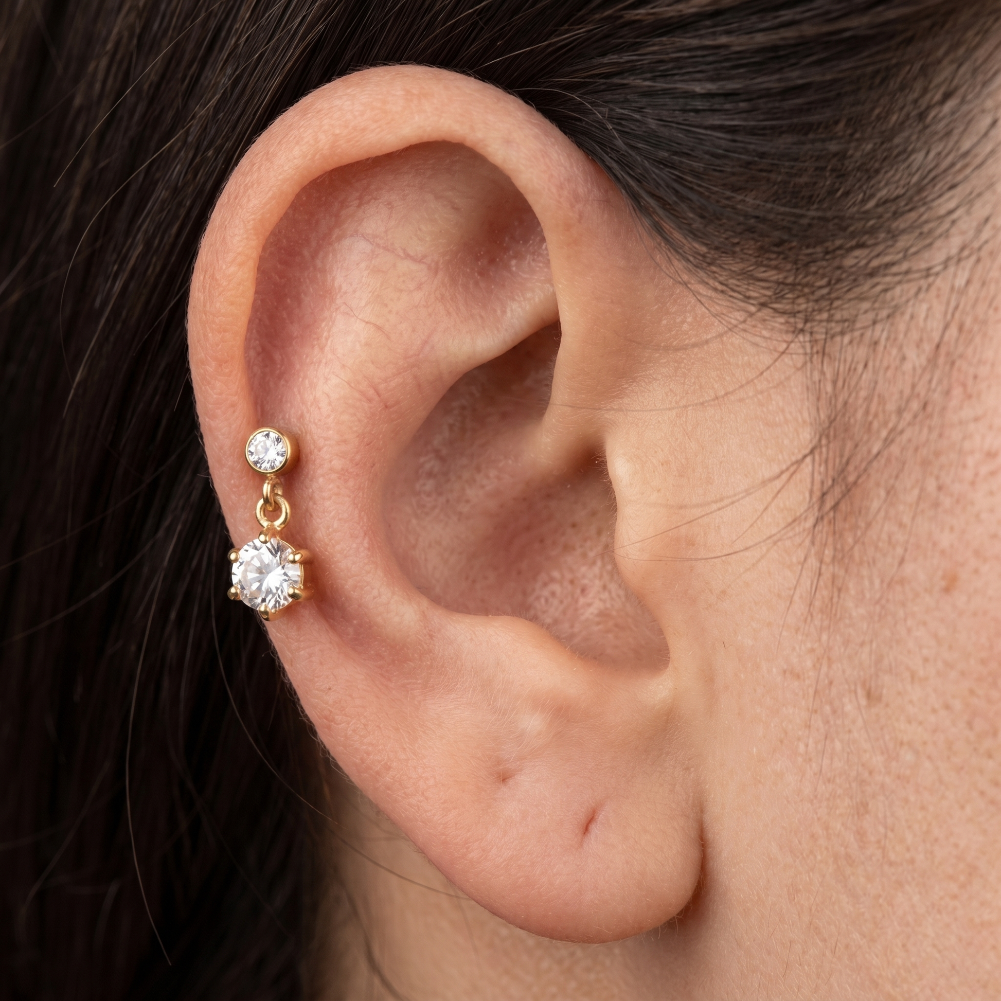 Silver zircon dangle stud — mid helix piercing placement
