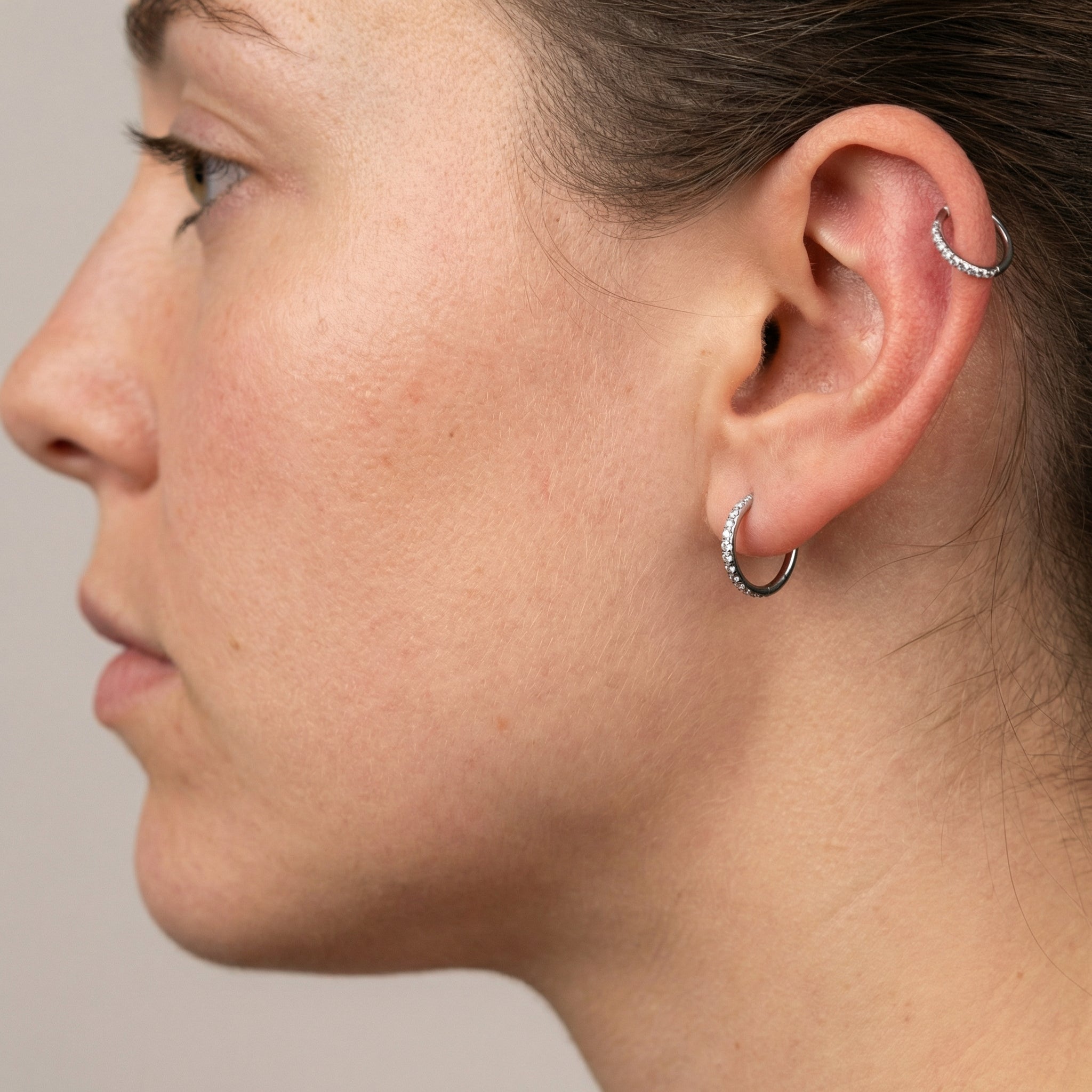Triple Forward Helix Piercing - Profile of a model